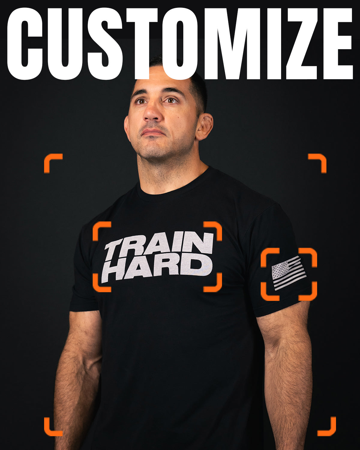Customizeable Tees from Train Hard. Image shows a man wearing a black t-shirt with 'TRAIN HARD' text on a dark background